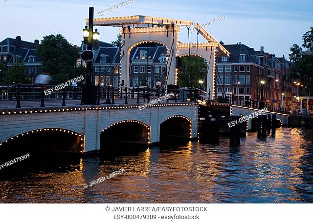 Magere Brug, Skinny Bridge on Amstel canal. Amsterdam. Netherlands