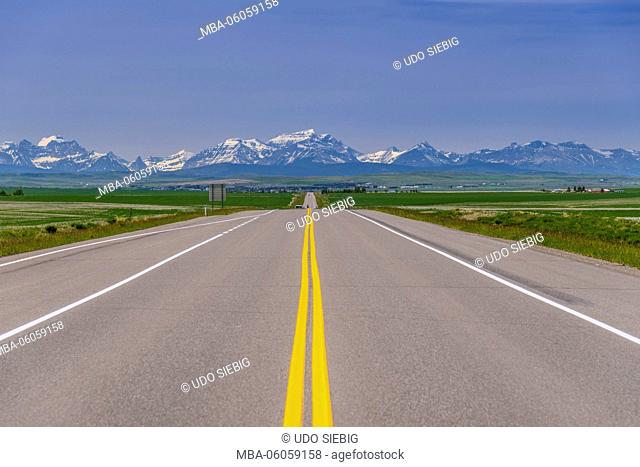 Canada, Alberta, Cardston, Highway 5 against Rocky Mountains in Cardston
