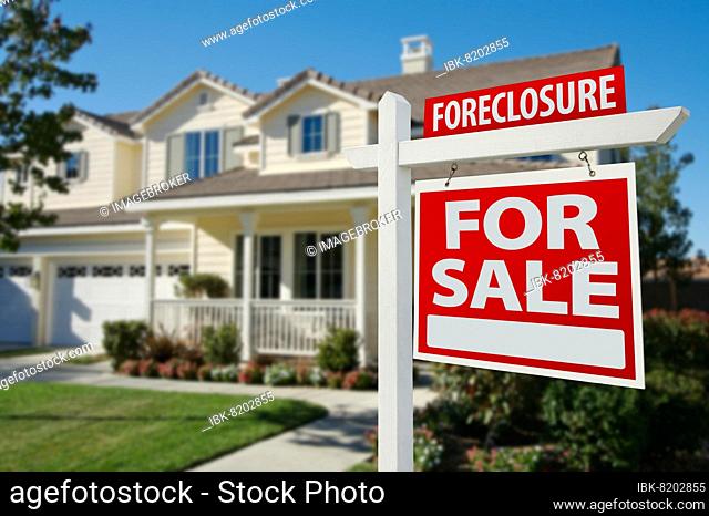 Foreclosure home for sale real estate sign in front of new house