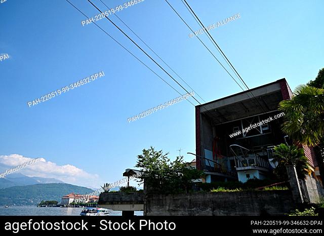 PRODUCTION - 11 May 2022, Italy, Stresa: Gondola number two stands in the bottom station of the Stresa-Mottarone cable car