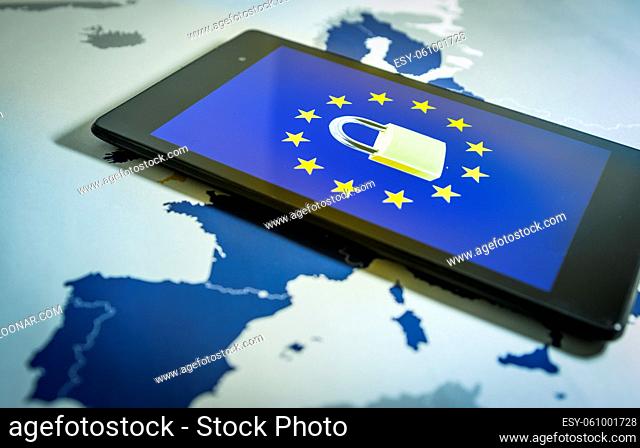 Padlock and EU flag inside smartphone and EU map, symbolizing the EU General Data Protection Regulation or GDPR. Designed to harmonize data privacy laws across...