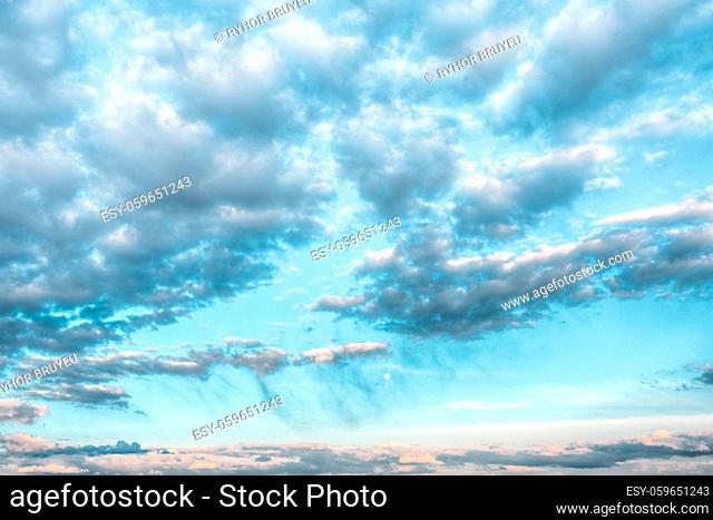 Panorama Of Bright Blue Sky With White Fluffy Clouds. Cloudy Sky. Blue Sunny Cloudscape Background