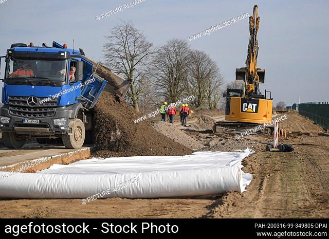 16 March 2020, Brandenburg, Werneuchen: A construction road to the ""Weesow-Willmersdorf"" solar park is being built. On the same day the construction work for...