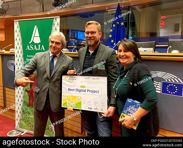 (L-R) Portuguese MEP Nuno Melo, Czech farmer Matej Sklenar and Czech MEP Michaela Sojdrova pose to photographers in Brussels, Belgium, December 6, 2023
