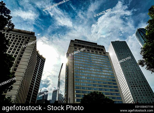 Building group of Hong Kong and cloudy sky. Shooting Location: Hong Kong Special Administrative Region