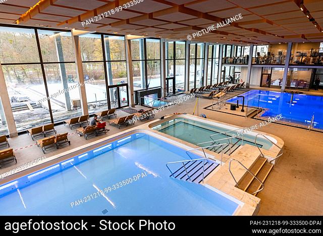PRODUCTION - 15 December 2023, Hesse, Bad Nauheim: View from an elevated position of various pools in the Sprudelhof thermal spa before it opened