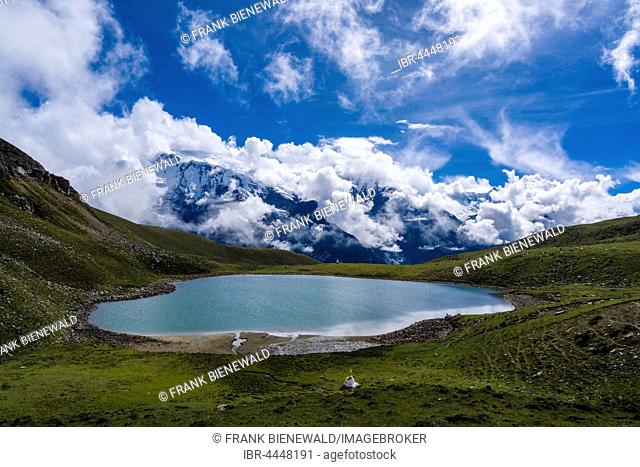 View across Ice Lake on Annapurna range, thunderstorm clouds, Braga, Manang District, Nepal