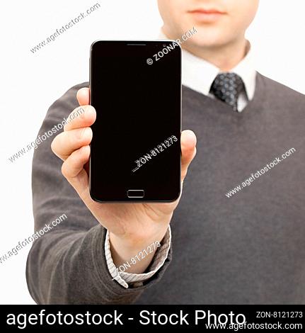 Male holding mobile smart phone in right hand