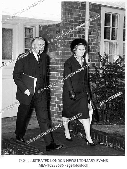 James Harold Wilson (1916-1995), Baron Wilson of Rievaulx, British Labour leader and Prime Minister, pictured with his wife leaving their home in Hampstead...