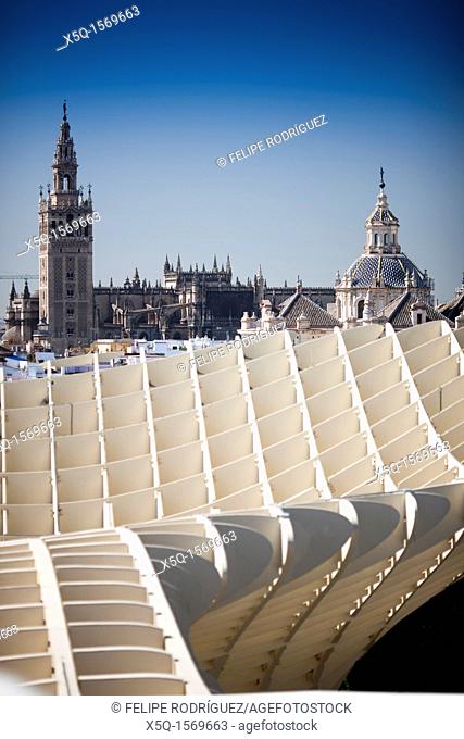 The Giralda tower left and El Salvador dome right as seen from the top of Metropol Parasol foreground, Seville, Spain