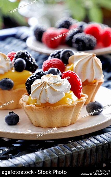Lemon cream tartlets with fresh berries