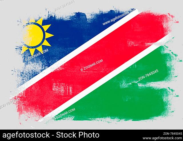 Flag of Namibia painted with brush on solid background