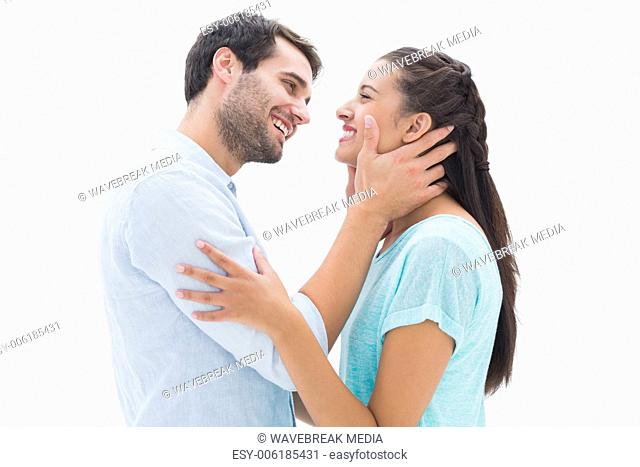 Attractive young couple about to kiss