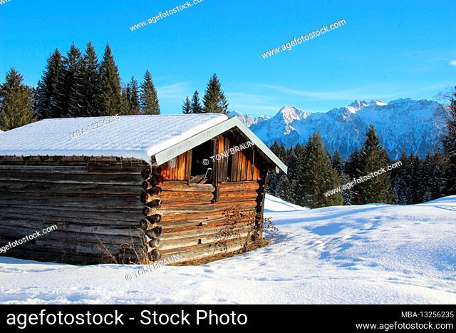 Winter hike near Mittenwald, near Elmau, Klais, Europe, Germany, Bavaria, Upper Bavaria, Werdenfels, winter, atmospheric hay barn in front of the Karwendel...