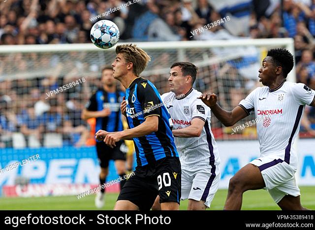 Club's Charles De Ketelaere, Anderlecht's Josh Cullen and Anderlecht's Marco Kana fight for the ball during a soccer match between Club Brugge KV and RSC...