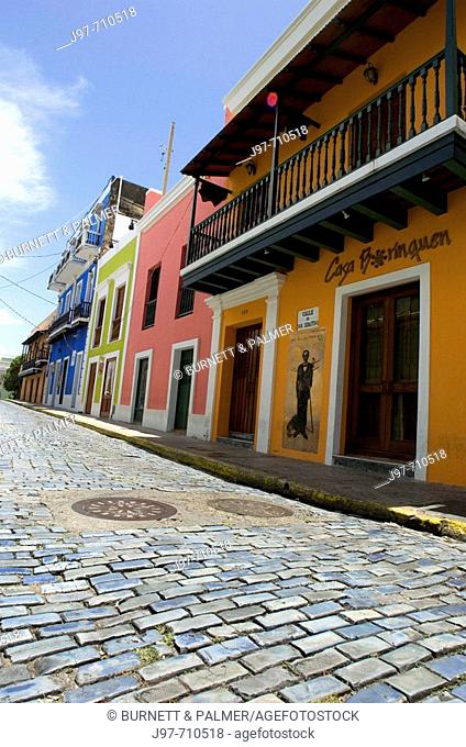 Old Cobblestones streets still exists in parts of Old San Juan like this Calle San Sebastian, San Juan, Puerto Rico, Caribbean Sea