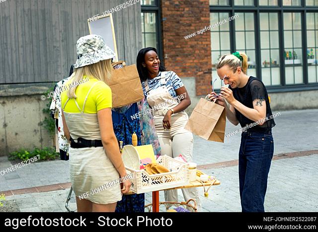 Young women at yard sale