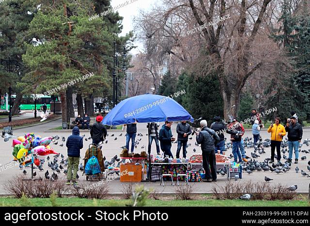 17 March 2023, Kazakhstan, Almaty: Visitors are walking in a park. Under the impact of last year's severe unrest, Kazakhstan in Central Asia will hold early...