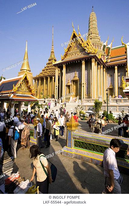 Tourists visiting Wat Phra Kaew, the most important Buddhist temple of Thailand, Ko Ratanakosin, Bangkok, Thailand