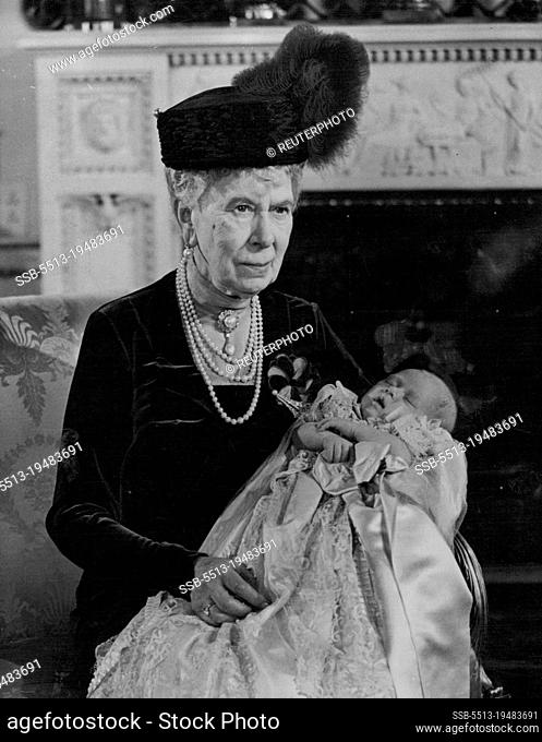 Baby Prince Christened At Buckingham Palace -- Great grandmother admires the baby Prince. Queen Mary proudly holds the little Prince Charles after the...