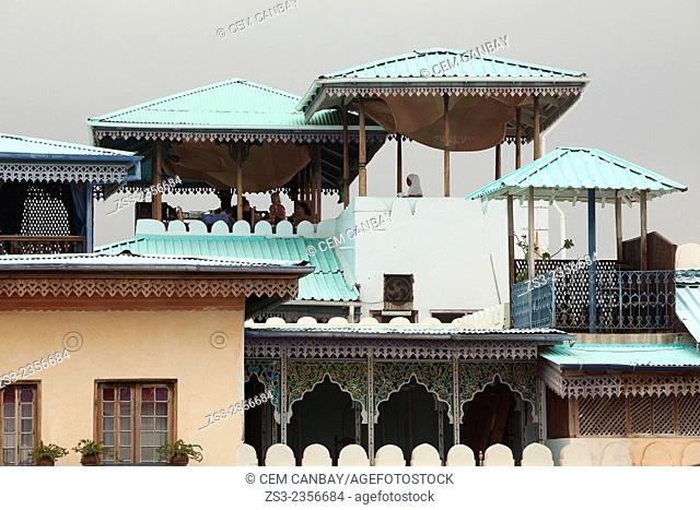 People having breakfast on the roof of a hotel, Stone Town, Unguja Island, Zanzibar Archipelago, Tanzania, East Africa