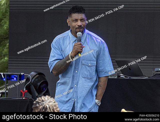Deon Cole speaks prior to United States Vice President Kamala Harris making remarks honoring the 50th anniversary of hip hop at the Vice President's residence...