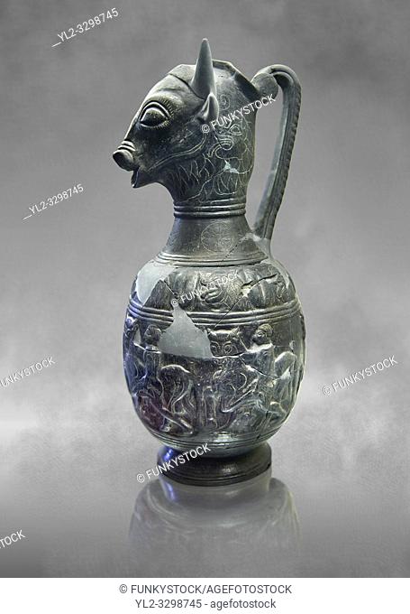 Side view of the 6th century BC Etruscan Bull headed bucherro style oinochoe, or wine jug, made in Chuisi and excavated from the necropolis de Fonte Rotella
