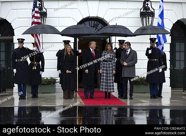 United States President Donald J. Trump, center left, and First lady Melania Trump, center right, stand for photographs with the Prime Minister of Greece...