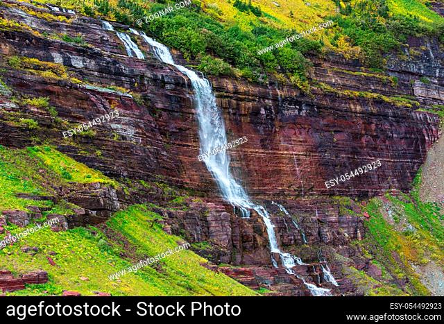Waterfall in Galacier National Park, Montana, USA. Autumn season