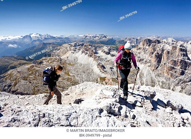 Climbers, ascent of the Tofane di Roze on the Giovanni Lipella via ferrata , behind the Sella and the Gardena, left the Marmolada, Dolomites, Cortina d'Ampezzo