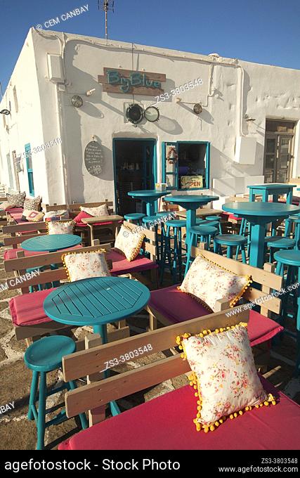 Tables and chairs of a fancy bar-restaurant at the town center, Naoussa, Paros Island, Cyclades Islands, Greek Islands, Greece, Europe
