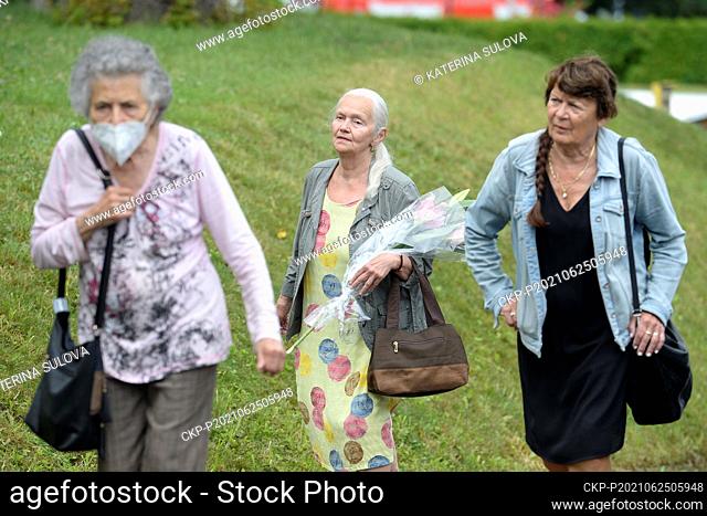 People come to the last public farewell with Czech actress Libuse Safrankova on June 25, 2021, to the church of St. Agnes of Bohemia in Prague-Roztyly