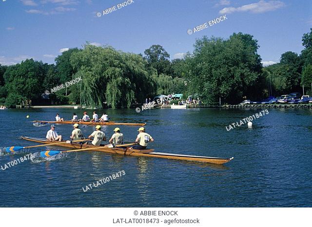 Canoeists racing on River Thames at the Goring & Streatley Annual regatta. Boats