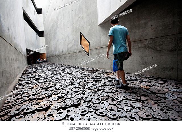 Germany, Berlin, Jewish Museum, by Daniel Libeskind, Memory Void Room, Installation, Shalechet Fallen Leaves by Menashe Kadishman