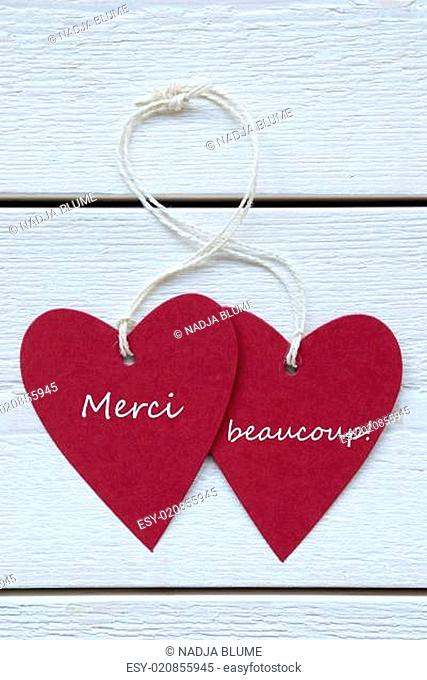 Two Hearts Label With French Merci Beaucoup Means Thank You Vertical