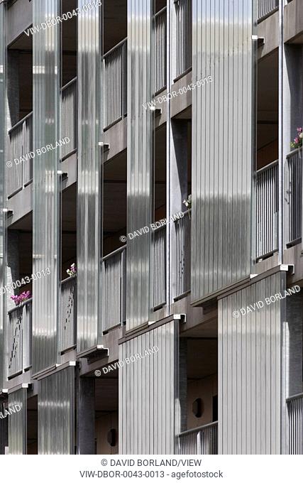 Chasse Park Housing, Breda, Netherlands. Architect: OMA, 2001. Detail of metallic finish on apartment block facade, designed by various architects within...