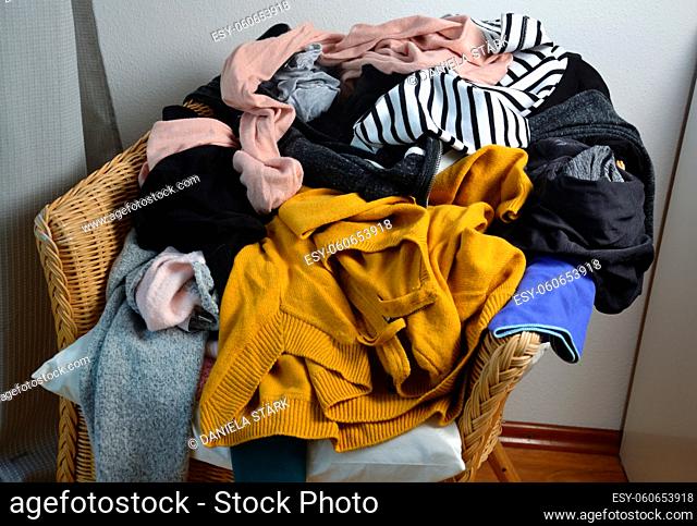 Pile of clothes on a chair