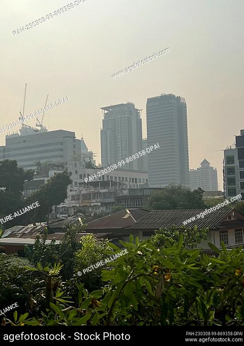 08 March 2023, Thailand, Bangkok: Smog hangs over the city in the Sathorn district. Actually, the sky would be blue, but Bangkok and other parts of Thailand are...