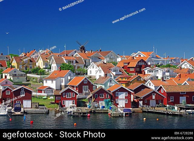 Harbour with wooden houses, windmill, Fiskebäckskil, Västra Götalands, Sweden, Europe