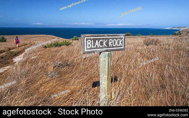 Hiker at Black Rock Point, Santa Rosa Island, Channel Islands National Park, California USA