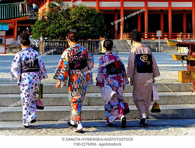 Heian Shrine - Heian Jingu - is a Shinto shrine located in Sakyo-ku, Kyoto, Japan, here young four women in kimono (traditional dress)