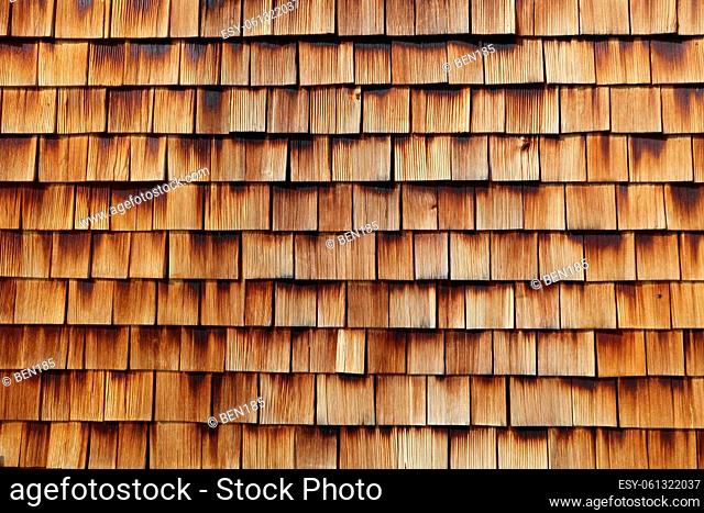 Abstract wooden texture of cedar shingles in Austria