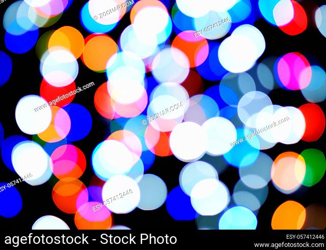 multicolored bokeh, blurred holiday lights, black background
