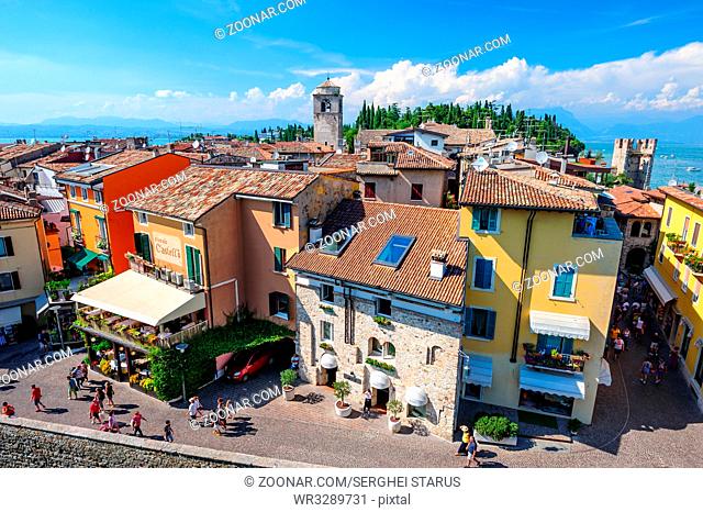 Sirmione, province of Brescia, Lombardy, northern Italy, 15th August 2016: view to the old roofs of Sirmione town on lake Lago di Garda