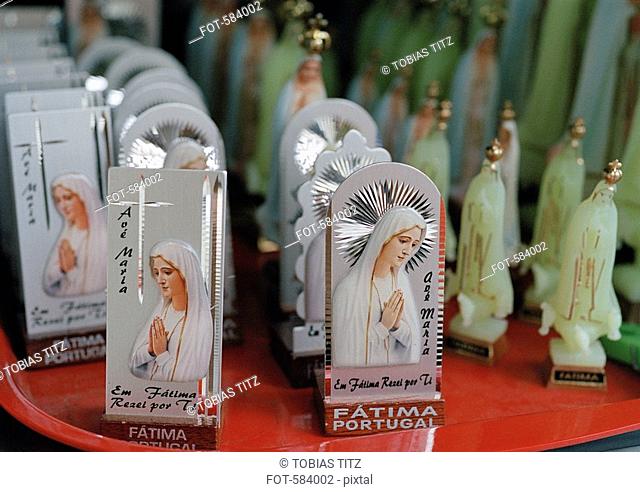 Virgin Mary statuettes in a shop