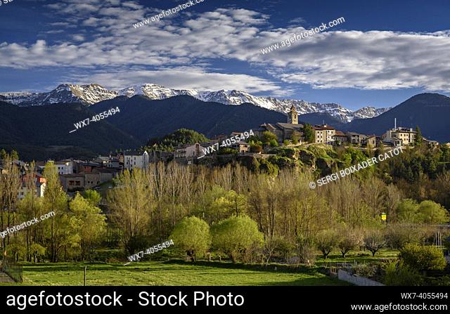 Bellver de Cerdanya panoramic views in spring, with the snowy Serra del Cadí in the background (Cerdanya, Catalonia, Spain, Pyrenees)