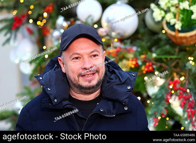 RUSSIA, MOSCOW - DECEMBER 19, 2023: Fashion designer Sergei Yefremov attends the opening of an exhibition of designer Christmas trees in Kuznetsky Most Street