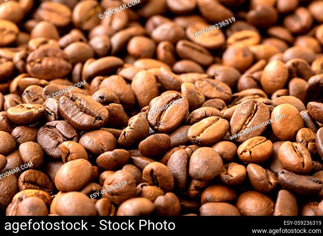 Brown roasted coffee beans. Espresso dark, aroma, black caffeine drink