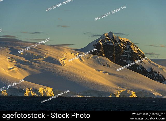 View of mountains in morning sunshine in the Gerlache Strait in the Antarctic Peninsula region