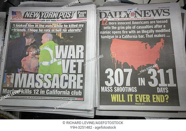 Front pages of New York newspapers on Friday, November 9, 2018 report on the shooting by former Marine, Ian David Long on Wednesday